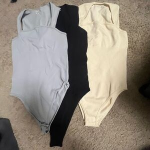 Elegant Women's Bodysuit Trio - Gray, Black, and Cream